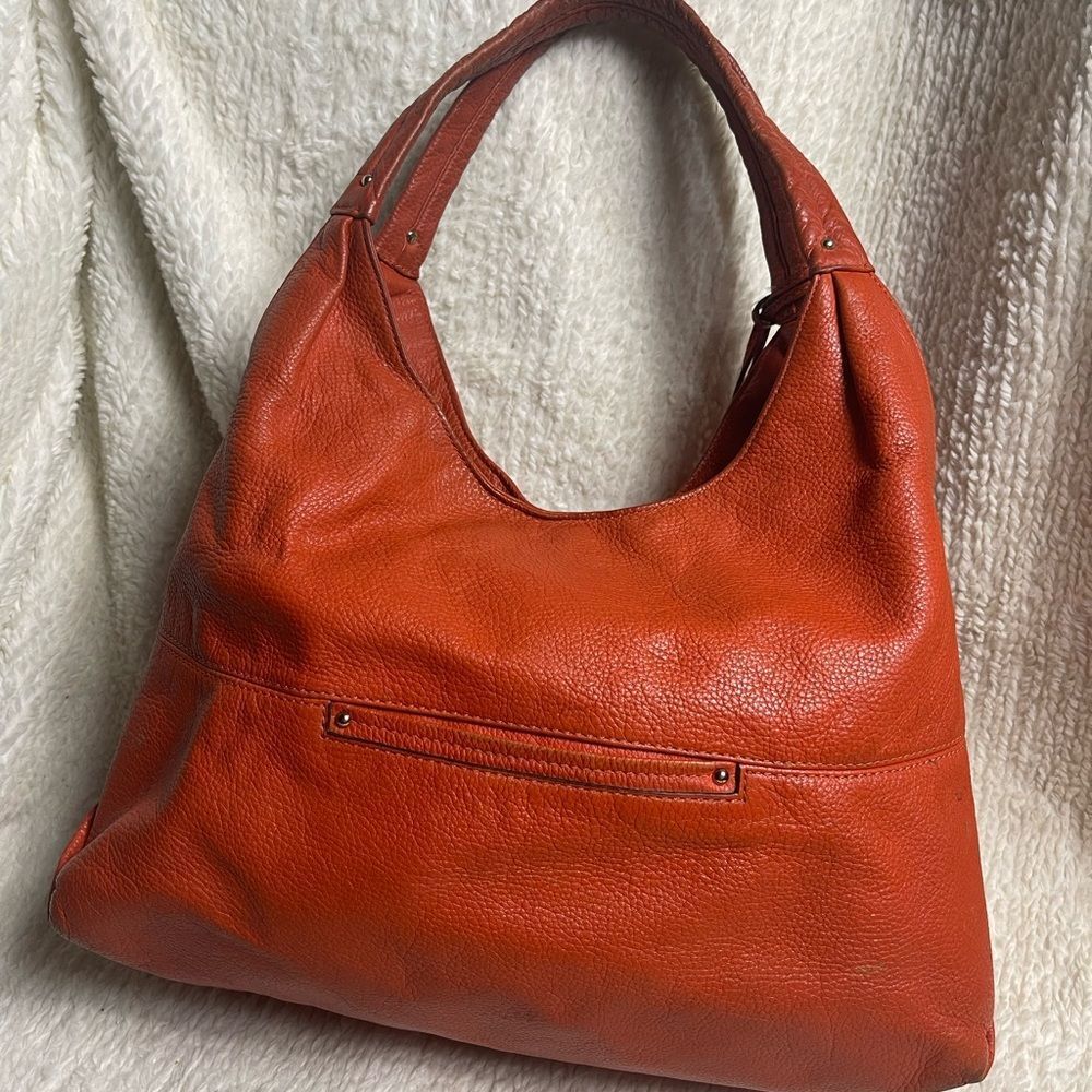 Michael Kors Leather Orange Austin Large shoulder Bag gold tone hardwares. - Picture 6 of 16